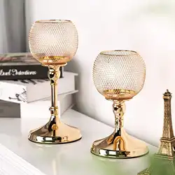 Une image de Trouver le cadeau parfait grâce à l'astrologie : l'ensemble de bougeoirs dorés pour une Balance